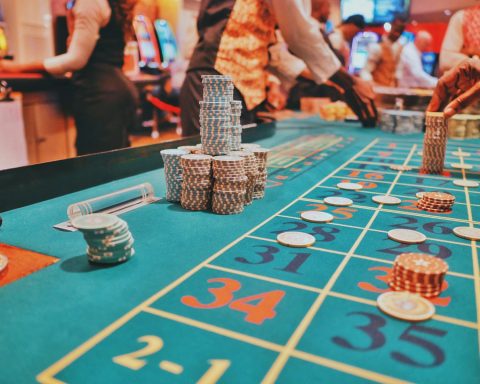 a casino table with a lot of chips on it