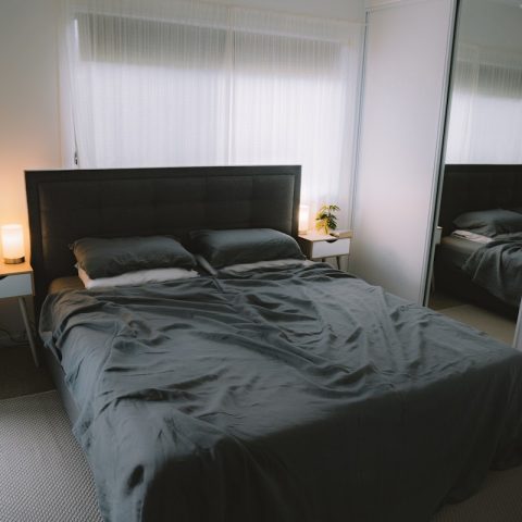 black bed linen on bed