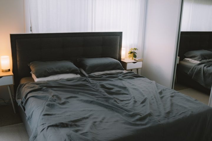 black bed linen on bed