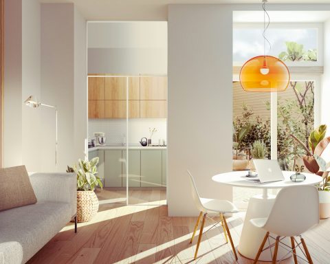 a living room with a couch a table and chairs